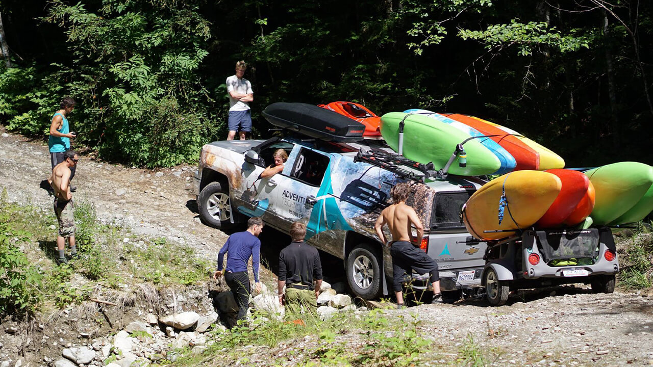 truck with kaya trailer full of kayaks