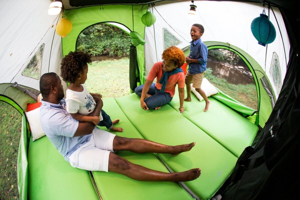 family playing inside GO Camper