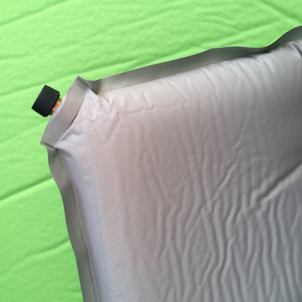 corner sleeping pad studio photo back view