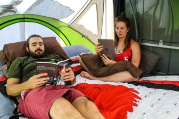 people reading inside GO Camping Trailer