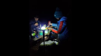 WayLight Hiking Pole being used to illuminate table with food