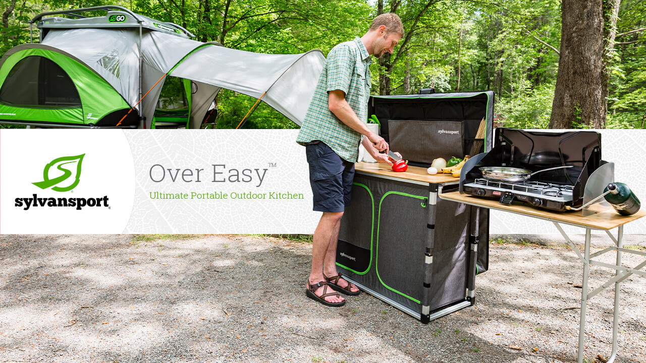 Men cutting vegetable with Outdoor kitchen