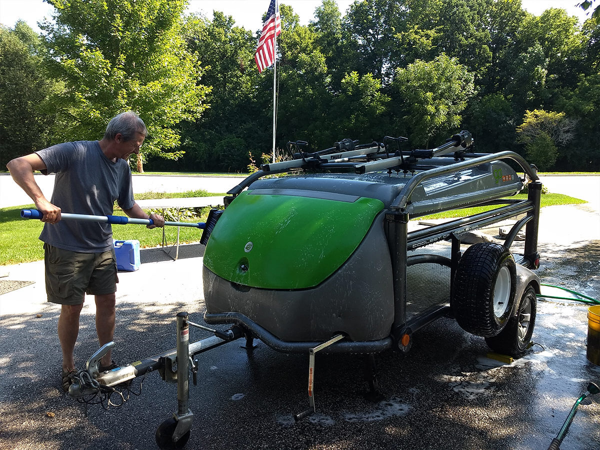 How to clean Camp Trailer? men washing his GO Trailer