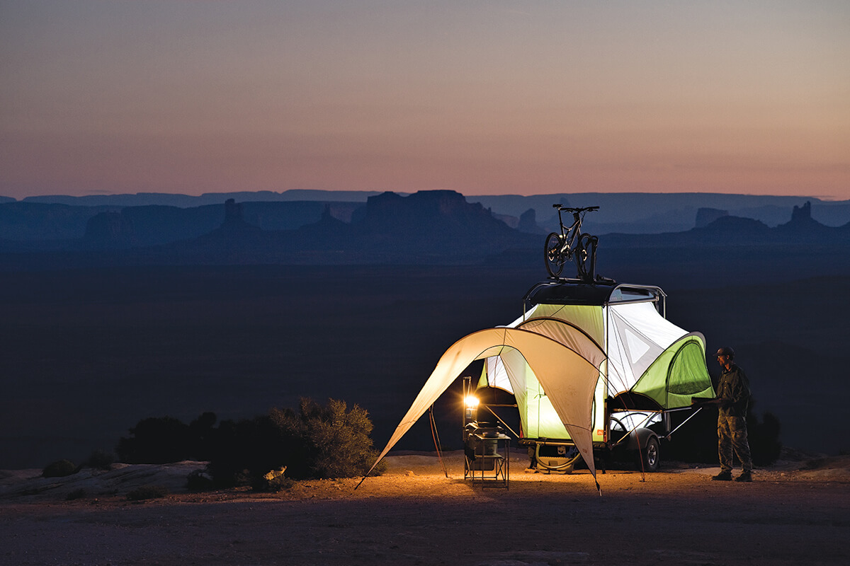 men preparing/leaving campground sunrise