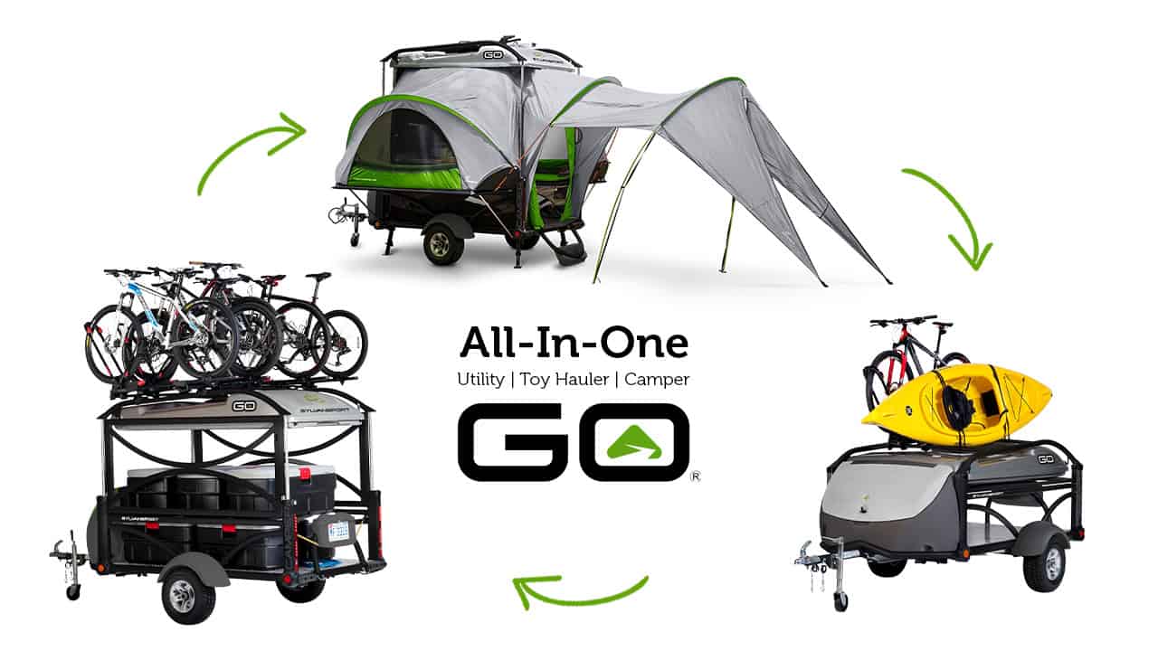 Compact SylvanSport GO pop-up camper with outdoor gear and bikes for adventure travel.