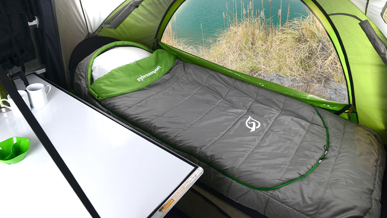 angled top view of sleeping bag in GO camping trailer