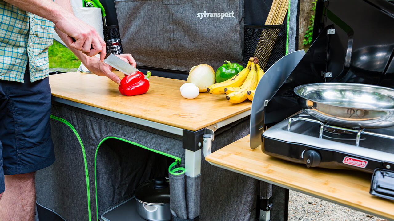 close up of cutting vegetables on camp kitchen