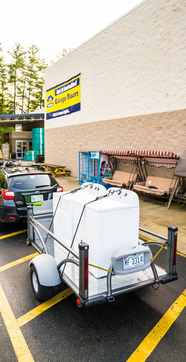 Subaru and utility trailer