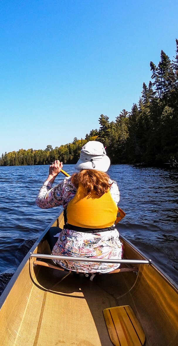 woman paddling a kayak