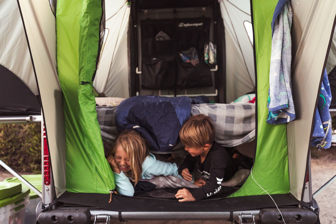 kids playing inside GO camper