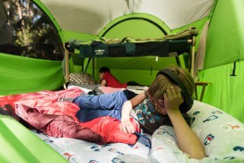 kids laying down and playing inside Gozeebo