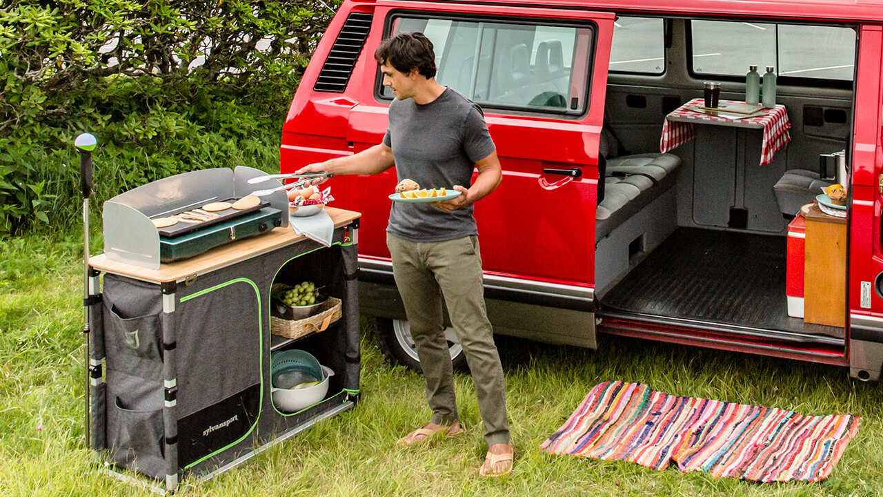 Men Cooking Camping stove and food