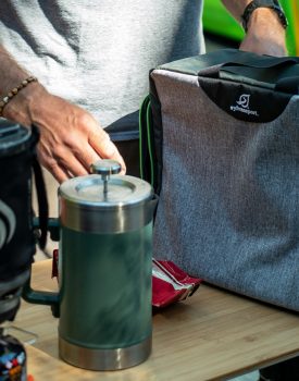 Men using packing cube SylvanSport coffee