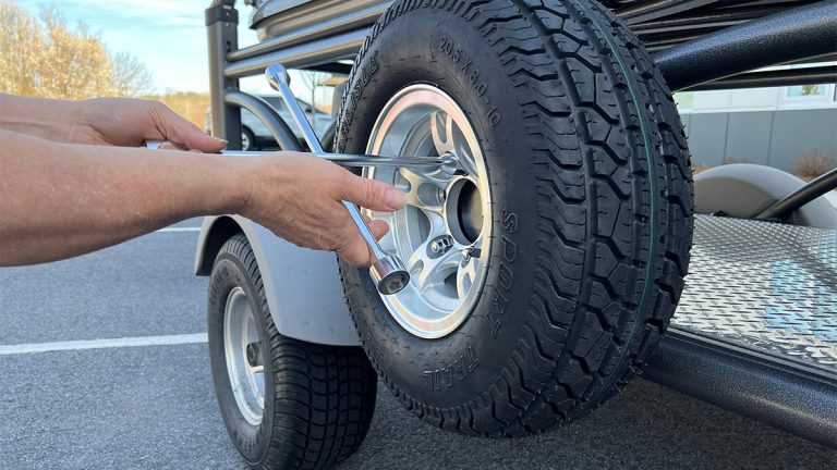 Full Size Spare Tire side GO trailer people working