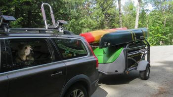 Fuel efficiency Volvo GO trailer with kayaks dog