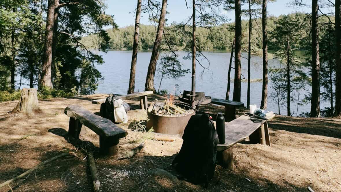 Camp Circle with benches facing lake