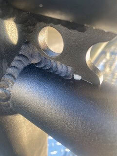 Close-up of SylvanSport Optima trailer hitch and frame details.