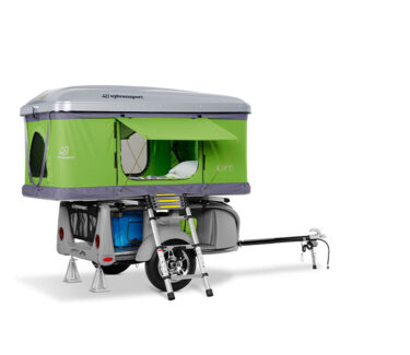 Compact SylvanSport GO camping trailer with pop-up tent and gear storage.