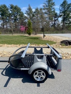 Compact SylvanSport Optima trailer for outdoor adventures and camping.