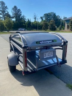 SylvanSport trailer with compact design and sturdy build for outdoor activities.
