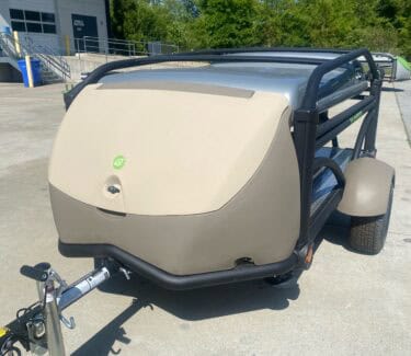 Compact SylvanSport Optima trailer for outdoor adventures and camping.