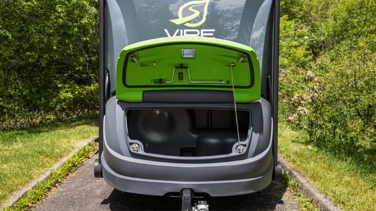 VIRE Travel Trailer with open rear hatch showing storage space and green interior.