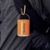 Flextail Tiny Pump 2x attached to a backpack for outdoor use.