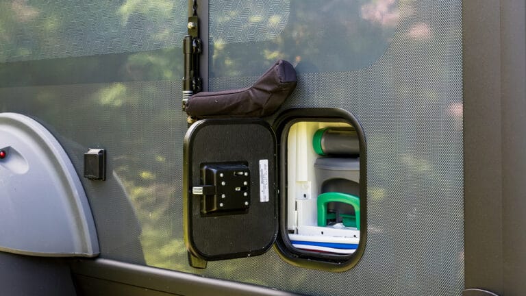 SylvanSport VIRE travel trailer with external utility access panel.